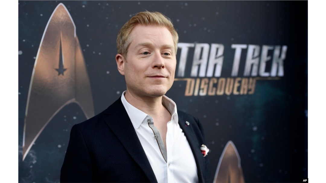 FILE - Anthony Rapp, cast member in "Star Trek: Discovery," poses at the premiere of the new television series in Los Angeles, Sept. 19, 2017.