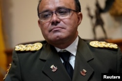 Venezuelan Colonel Jose Luis Silva, Venezuela’s military attache at its Washington embassy to the United States, after announcing that he is defecting from the government of President Nicolas Maduro, Jan. 26, 2019.