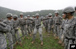 FILE - United States Forces Korea 2nd Infantry Division soldiers take part in an air assault training session at Camp Casey in Dongducheon, South Korea.