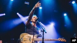 British musician Sting performs on stage at the Bataclan concert hall in Paris, France, in this photo provided by Universal Music France, Nov. 12, 2016. 