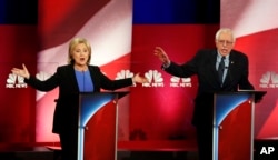 FILE - Democratic presidential candidates, former Secretary of State Hillary Clinton, left, and Sen. Bernie Sanders, I-Vt. talk over each other during the Democratic presidential primary debate in Charleston, South Carolina, Jan. 17, 2016.