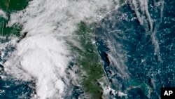 In this image provided by NOAA, Tropical Storm Gordon approaches the United States on Sept. 4, 2018.
