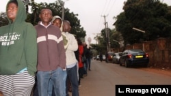 Kenyan Voters Undeterred by Long Lines, Morning Rain, Afternoon Heat