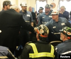 Robert Murray, founder and CEO of Murray Energy greets coal miners at the EPA hearing in Charleston, West Virginia, Nov. 28, 2017 before speaking to the panel supporting the repeal of the Clean Power Plan.