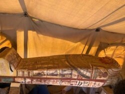 This Sept. 2020 photo provided by the Ministry of Tourism and Antiquities shows one of more than two dozen ancient coffins unearthed near the famed Step Pyramid of Djoser in Saqqara, south of Cairo, Egypt. (Ministry of Tourism and Antiquities via AP)