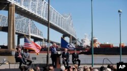 FILE - Then-Vice President Joe Biden speaks after touring the Port of New Orleans to commemorate the seventh anniversary of the American Recovery and Reinvestment Act in New Orleans, Feb. 17, 2016.