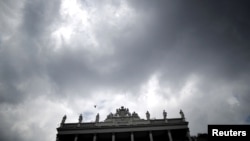Dark clouds are seen over Palais Coburg hotel where the Iran nuclear talks meetings are being held in Vienna, Austria, July 9, 2015. 