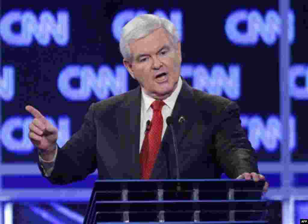 Republican presidential candidate former House Speaker Newt Gingrich reacts to a question at the start of the Republican presidential candidate debate at the North Charleston Coliseum in Charleston, S.C., Thursday, Jan. 19, 2012. Gingrich is denying that