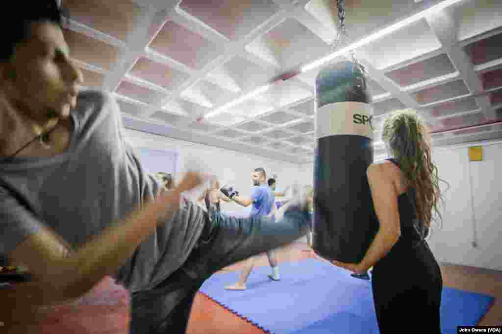 Weekly karate and self-defense lessons take place on the second floor at the Khora center, in the Exarchia district in Athens, Greece, Oct. 26, 2016.