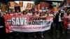 Protesters call on Indonesian President Joko Widodo to inaugurate General Budi Gunawan, who was last month named a corruption suspect, as national police chief during a march in Jakarta, Feb. 11, 2015.