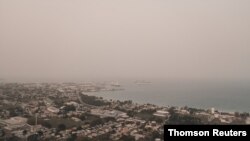 El polvo procedente del desierto del Sahara flota sobre la ciudad de Bridgetown, Barbados. Junio 23 de 2020.