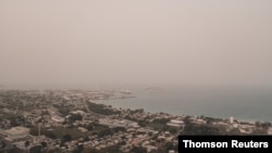 El polvo procedente del desierto del Sahara flota sobre la ciudad de Bridgetown, Barbados. Junio 23 de 2020.