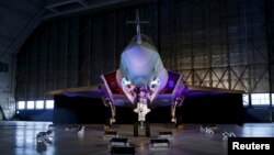 FILE - A Lockheed Martin F-35 Lightning II fighter jet is seen in its hangar at Patuxent River Naval Air Station, in the eastern U.S. state of Maryland, Oct. 28, 2015.