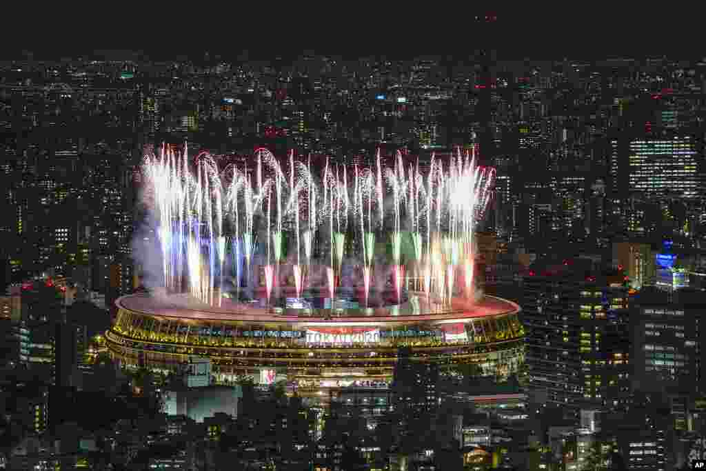 Fireworks illuminate over National Stadium viewed from Shibuya Sky observation deck during the Opening Ceremony for the 2020 Paralympics in Tokyo.