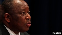 FILE - Alexis Thambwe, justice minister of the Democratic Republic of the Congo, Mwamba listens during a news conference at the U.N. headquarters in New York September 22, 2010. 