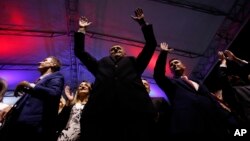 Bosnian Serb Milorad Dodik, President of the Bosnian Serb region of Republic of Srpska, greets supporters during celebrations after the result of the referendum in the Bosnian town of Pale, Bosnia, on Sunday Sept. 25, 2016.