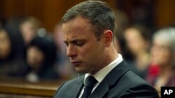 Oscar Pistorius cries in court in Pretoria, South Africa, Oct. 17, 2014 during the last day of sentencing procedures where the defense and prosecution will put their case for and against sentencing. 