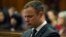 Oscar Pistorius cries in court in Pretoria, South Africa, Oct. 17, 2014 during the last day of sentencing procedures where the defense and prosecution will put their case for and against sentencing. 