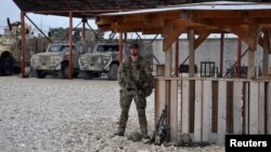 A soldier stands guard at Camp Shaheen in Mazar-i-Sharif, Afghanistan on March 26, 2017.