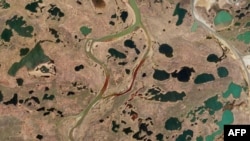 An aerial view of a large diesel spill in the Ambarnaya River outside Norilsk in the Arctic, taken June 4, 2020, is seen in this handout photo made available by 2020 Planet Labs on June 5, 2020.