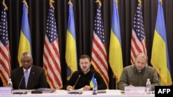 U.S. Secretary of Defense Lloyd Austin, Ukrainian President Volodymyr Zelenskyy and Ukrainian Defense Minister Rustem Umerov attend a Ukraine Defense Contact Group meeting on Sept. 6, 2024, at the U.S. air base in Ramstein, southwestern Germany.