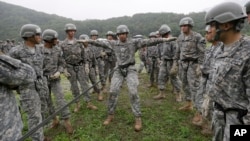 FILE - United States Forces Korea 2nd Infantry Division soldiers take part in an air assault training session at Camp Casey in Dongducheon, South Korea, July 24, 2015.