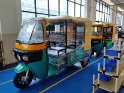Companies manufacturing e-rickshaws like Shigan Evoltz at Manesar near New Delhi have seen brisk demand in recent years. (A. Pasricha/VOA)