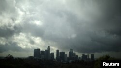 FILE - Rain clouds are seen over downtown Los Angeles, California U.S., Jan. 9, 2018.