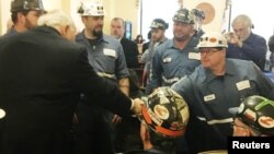 Robert Murray, founder and CEO of Murray Energy greets coal miners at the EPA hearing in Charleston, West Virginia, Nov. 28, 2017 before speaking to the panel supporting the repeal of the Clean Power Plan. 