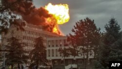 A picture taken on Jan. 17, 2019 in Villeurbanne near Lyon, shows an explosion on a rooftop of La Doua University Campus.