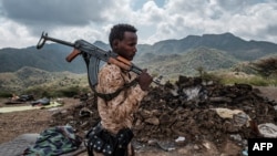 FILE - An Afar special forces fighter is pictured in Bisober, Tigray region, Ethiopia, Dec. 9, 2020. 