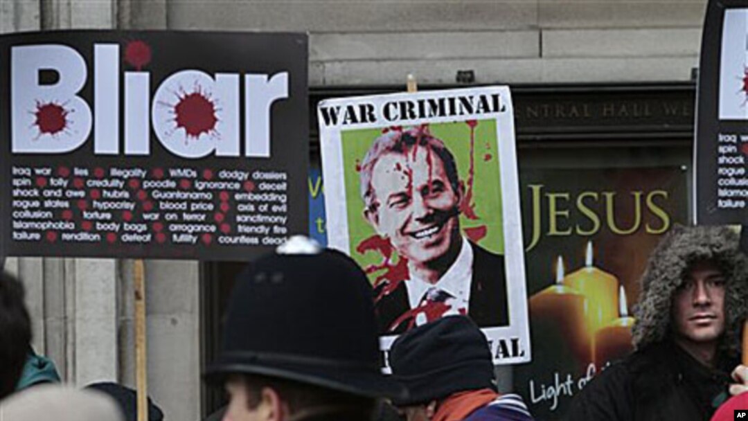 Protesters demonstrate against former British Prime Minister Tony Blair outside the venue where the Iraq inquiry is being held, in central London, 21 Jan 2011