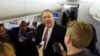 U.S. Secretary of State Mike Pompeo speaks to reporters aboard his plane en route to London, Jan. 29, 2020. Pompeo is to meet British Prime Minister Boris Johnson and other officials.