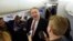 U.S. Secretary of State Mike Pompeo speaks to reporters aboard his plane en route to London, Jan. 29, 2020. Pompeo is to meet British Prime Minister Boris Johnson and other officials.