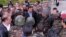 This July 31, 2013, screen grab from the official Instagram account of the Syrian Presidency purports to show Bashar Assad visiting with soldiers in Baba Armr, Homs province, Syria, in 2012. 