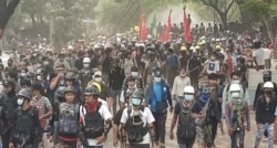 Demonstrators march in an anti-coup protest in Monywa, the capital of Sagaing Region, Myanmar, March 31, 2021. (Credit: VOA Burmese Service)