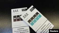 Juul e-cigarettes are seen on the counter of a vape store in Santa Monica