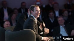 Facebook CEO Mark Zuckerberg speaks at the Axel Springer Award ceremony in Berlin, Feb. 25, 2016. 