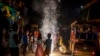 FILE - Children play with firecrackers during Diwali celebrations in New Delhi, India, on Nov. 4, 2021.