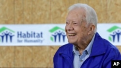 Former president Jimmy Carter is seen being interviewed at a Habitat for Humanity project site in Memphis, Tennessee, Nov. 1, 2015.