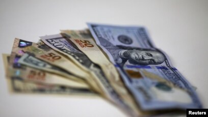 Slide Continues For Brazil S Real File Brazilian Real And U S Dollar Notes Are Pictured At A Currency Exchange Office In