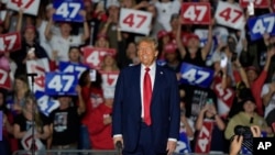 Republican presidential nominee former President Donald Trump arrives at a campaign rally at McCamish Pavilion in Atlanta, Georgia, Oct. 28, 2024.