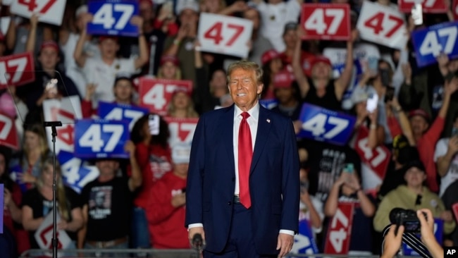 Republican presidential nominee former President Donald Trump arrives at a campaign rally at McCamish Pavilion in Atlanta, Georgia, Oct. 28, 2024.