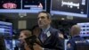 Traders work on the floor of the New York Stock Exchange (NYSE) March 4, 2016. 