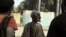 A man suspected of allegedly collaborating with Islamists is left bleeding after having been beaten, in the city of Diabaly, on January 22, 2013. The EU executive today announced 20 million euros of extra humanitarian aid to help tens of thousands of Mal