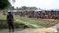 FILE - A soldier stands near the Cox's Bazar refugee camp in Bangladesh, near Rakhine state, Myanmar, during a trip by United Nations envoys to the region, April 29, 2018. 
