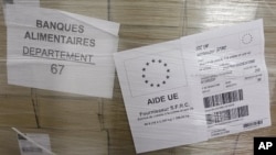 Packs of food, part of European subsidies are seen at a warehouse of the Banque Alimentaire (Food Bank) in Strasbourg, September 20, 2011.