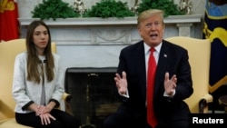 U.S. President Donald Trump meets with Fabiana Rosales, wife of Venezuelan opposition leader Juan Guaido at the White House in Washington, March 27, 2019. 