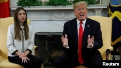 U.S. President Donald Trump meets with Fabiana Rosales, wife of Venezuelan opposition leader Juan Guaido at the White House in Washington, March 27, 2019. 