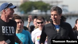 Democratic presidential candidate Beto O'Rourke jogs a 2 mile run with members of the LGBTQ community along the Hudson River Greenway in New York City, June 12, 2019. 